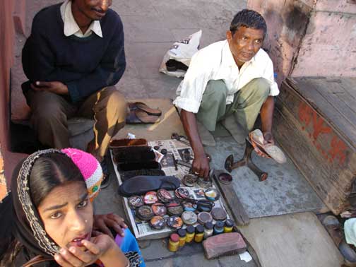 Shoemaker and customer.