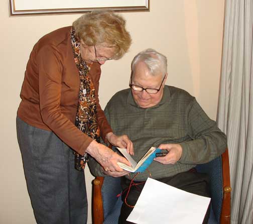 Horty presenting Uncle Eddie with a book.