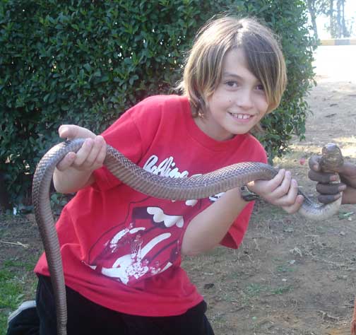 Alex holding snake.